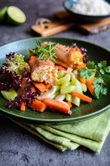 Roasted turkey breasts rolls stuffed with egg, Feta cheese, pepper and parsley, served with rice and steamed vegetable