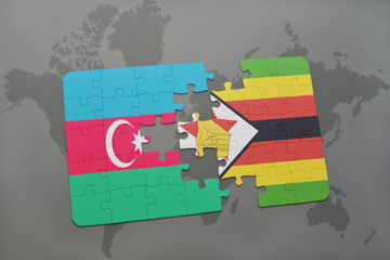 puzzle with the national flag of azerbaijan and zimbabwe on a world map