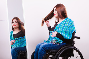 Fototapeta na wymiar Disabled girl looking at mirror.