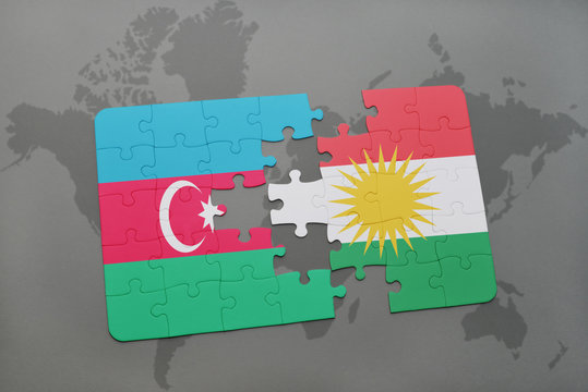 puzzle with the national flag of azerbaijan and kurdistan on a world map