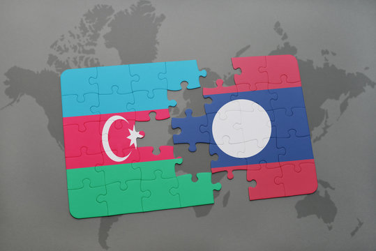 puzzle with the national flag of azerbaijan and laos on a world map