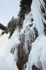 Ice Climber wide shot with bridge and tress