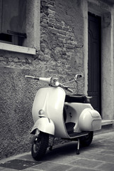 Old scooter parked in the street