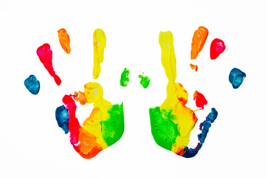 Colorful paint hand print over white background