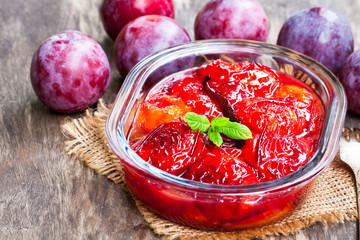 Baked  plums with caramel and vanilla pod