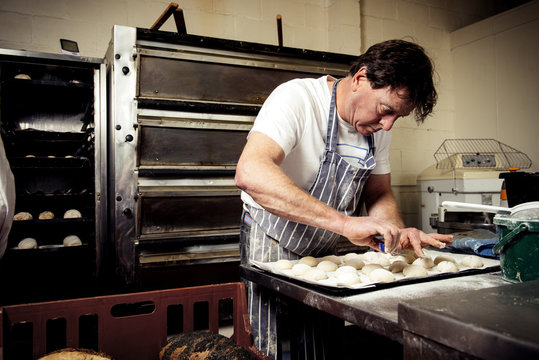 Male baker working in commercial kitchen
