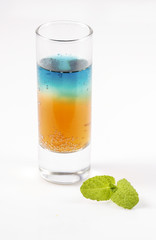 Colorful drink with fruit decoration.
