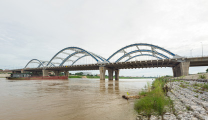 Fototapeta na wymiar Dong Tru bridge crossing Red River in Hanoi, Vietnam