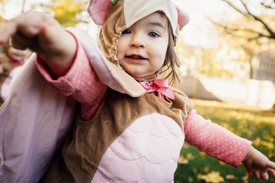 Portrait Of Cute Girl Wearing Bird Costume