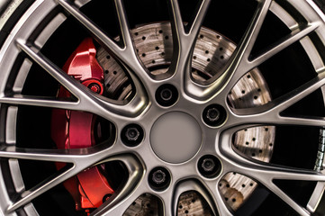 Close up of a car's rim, wheel with no emblem.