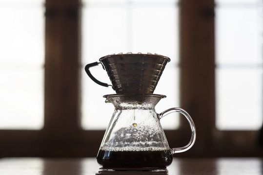 Close-up of coffee maker on table at home