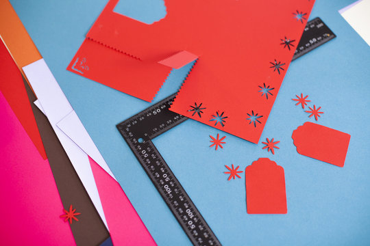 Young woman make scrapbook of the papers on the table using anti