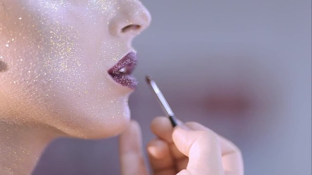 make-up artist doing make-up fashion