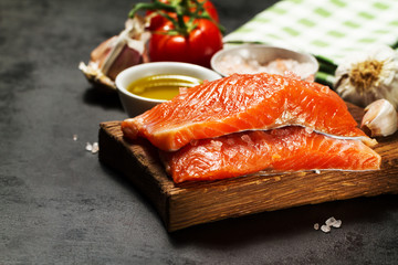 Tasty colorful Food Background with fresh Raw Fish Salmon and Co