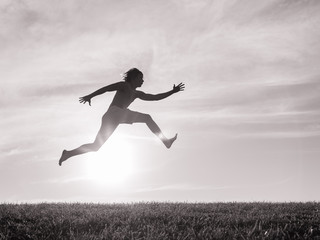 Male sprinting jumping.