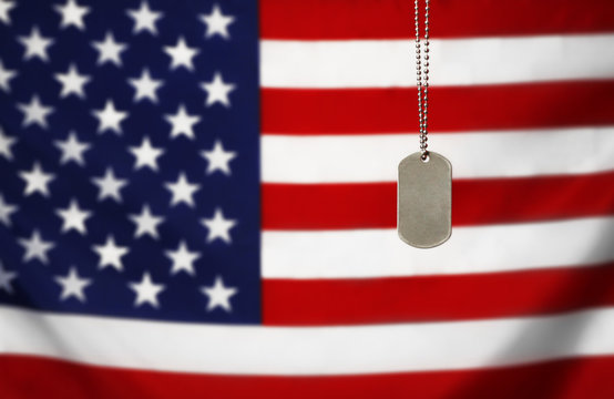 Military ID tag on USA flag background