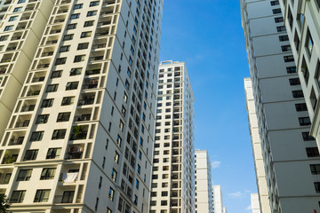 Fototapeta na wymiar Resident apartment buildings against blue sky