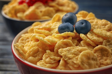 Bowl with cornflakes and berries, closeup