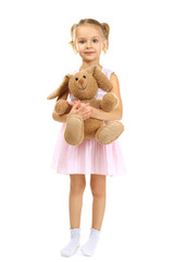 Cute little girl with bunny isolated on white
