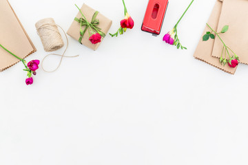 Pattern with red flowers, wine and gift box isolated on white background. Flat lay, Top view.