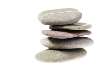Pebble from beach against a white background