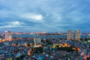 Fototapeta na wymiar Aerial view of north West lake ( Ho Tay) in Tay Ho district. Hanoi cityscape at twilight