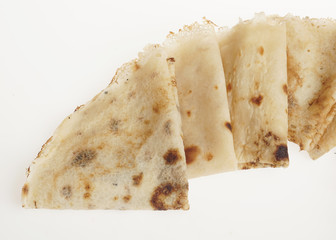 Freshly baked rolled blinis or crepes isolated