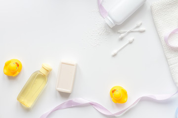 baby accessories for bath with duck on white background