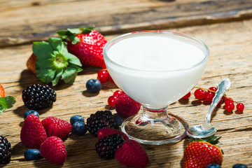 BIO natural yoghurt with fresh fruit in a bowl.