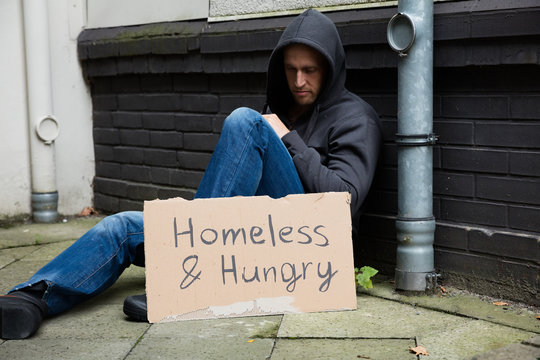 Homeless And Hungry Man