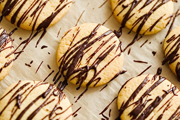 Homemade cookies with a dark chocolate drizzle