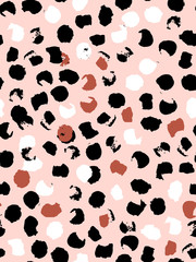 Abstract seamless pattern of leopard spots in black, red, white and pink. Ink and brush. Hand drawn. Vector illustration.