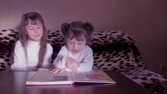 Children reading the book. Full HD