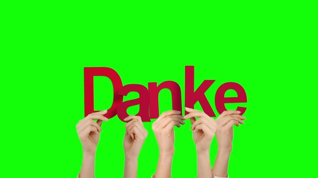 Hands holding up danke