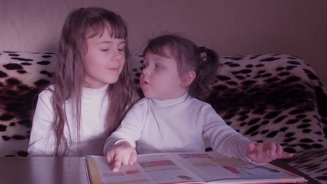 Children reading the book. Full HD