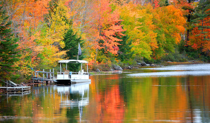 Ricker pond in Vermont with fall foliage