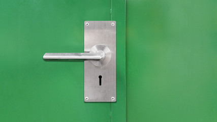 Green door with Metal door handle