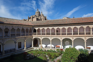 Fototapeta na wymiar SALAMANCA, SPAIN, APRIL - 18, 2016: The atrium of Convento de las Duenas and the Cathedral.