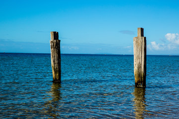 2 old posts in the ocean