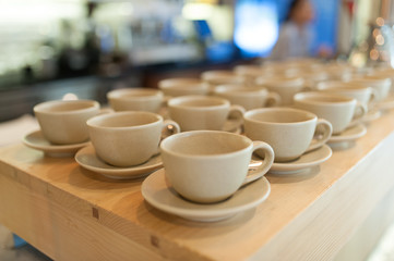 many coffee cup on table soft focus