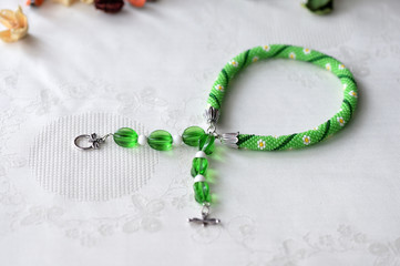 Beaded crochet choker necklace with flower print close up