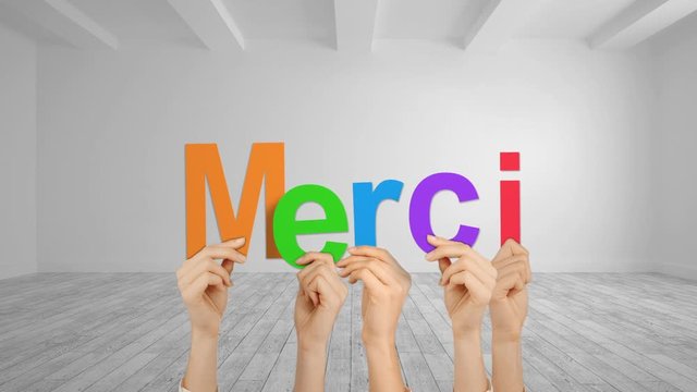 Hands holding up merci