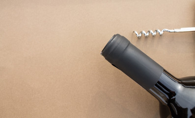 Red wine bottle and corkscrew