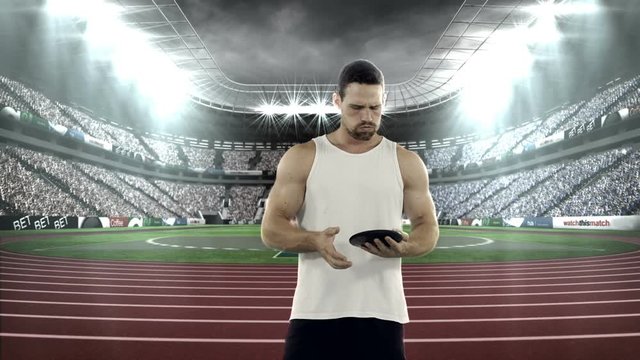 Male athlete practicing discus throw
