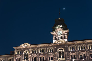 Reflections on the sea of Trieste at dusk - Historical buildings and lights