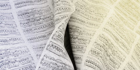 Fototapeta premium Musical notes fabric background, 3d rendering