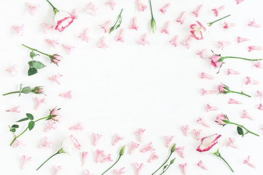 Floral composition. Frame made of pink flowers. Valentine's Day. Flat lay, top view