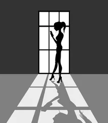 Foto auf Acrylglas Silhouet van vrouw met mobiele telefoon voor een venster © emieldelange