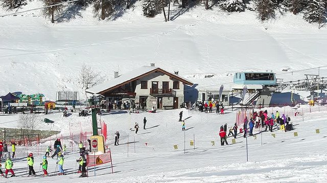Brusson, Aosta Valley, Italy. January 15, 2017. Ski resort with skiers and ski lift