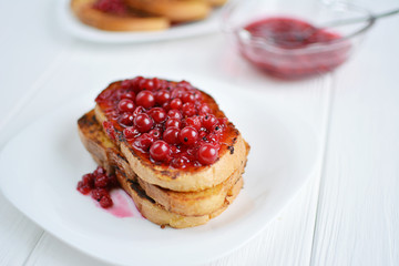 Homemade bread toast with berry jam  on a white background